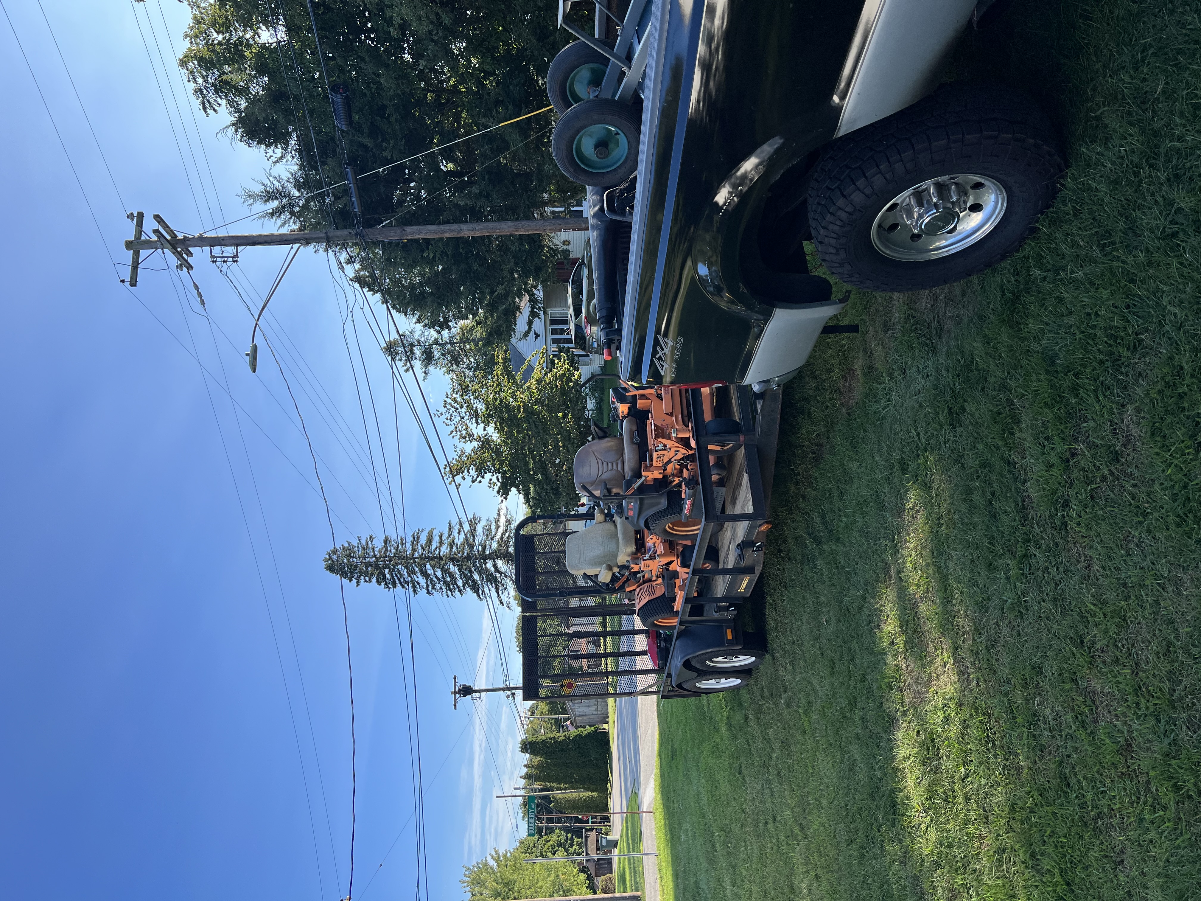 Faria Lawn Care truck and trailer in Griswold CT